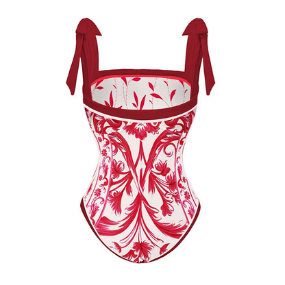 Un Maillot de bain Rouge Femme fleuri rouge et blanc de la collection BREEZE BEEZ avec des bretelles à nouer et un design classique.