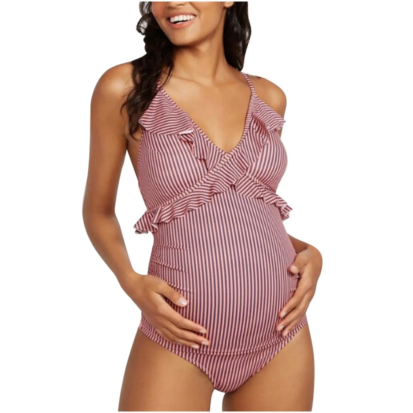 Une femme portant un Maillot de Bain Femme Enceinte | Rouge Rayé 1 Pièce de la marque BREEZE BEEZ, prête à profiter des vacances.