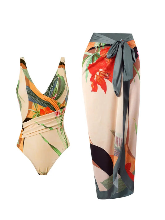 Ensemble Maillot de Bain 2 Pièces Imprimé et paréo d'inspiration tropicale avec un imprimé floral et feuillage vibrant sur fond neutre, conçu pour toutes les morphologies par BREEZE BEEZ.