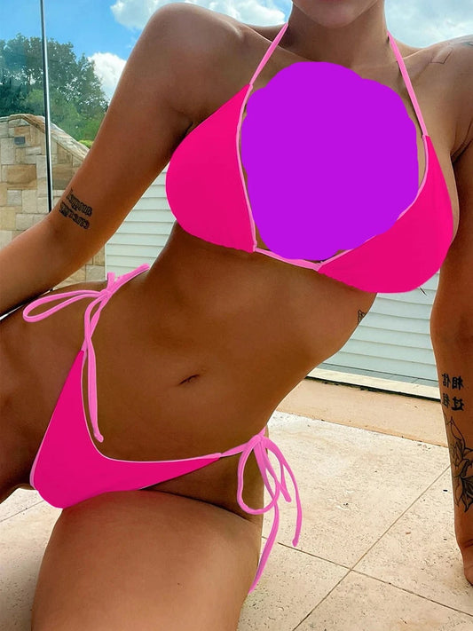 Une personne portant un BREEZE BEEZ Maillot de Bain Femme 2 Pièces Bikini Rose profitant du soleil balnéaire.