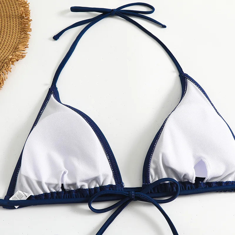 A BREEZE BEEZ Maillot de Bain Femme 3 Pièces blanc et bleu marine | Ensemble haut & Bas haut à liens à nouer, affiché sur fond clair, pouvant éventuellement faire partie d'un ensemble de maillot de bain.