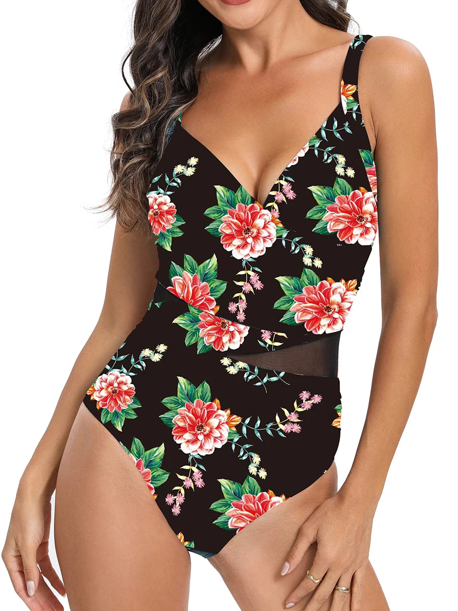 Un Maillot de Bain Femme 1 Pièce Elégant Floral noir avec un motif floral rouge et blanc vibrant, parfait pour se prélasser au soleil par BREEZE BEEZ.