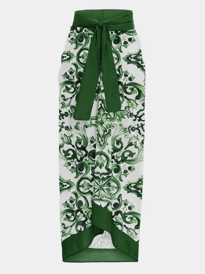 Élégante jupe crayon taille haute avec un motif baroque vert et blanc audacieux, accentuée par un détail noué confortable à la taille de BREEZE BEEZ.