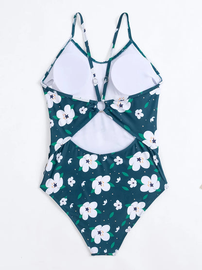 Un confortable Maillot de Bain Vert Femme 1 Pièce à imprimé floral unique avec un motif à nouer sur le devant sur fond blanc par BREEZE BEEZ.